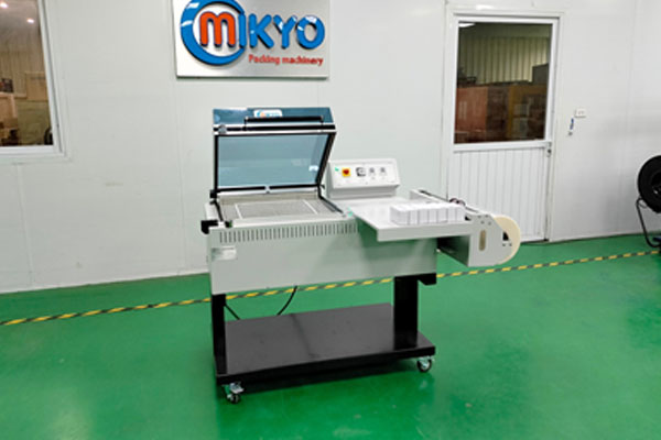 Máy cắt màng bán tự động kèm buồng co